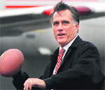 Republican presidential candidate Mitt Romney holds a baseball during a campaign rally in Ohio.  AP/PTI