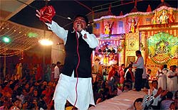 An artiste performs at a Jagran organised on the Amrik Singh Road in Bathinda on Sunday evening