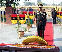 Brig Rakesh Raina lays a wreath at the war memorial in Asafwala village of Fazilka district