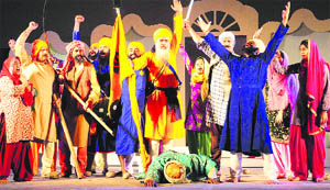 Artistes stage Main Tera Banda at Baba Banda Singh Bahadur Memorial, Chappar Chirri village, on Sunday. 
