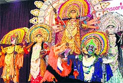 A tribal group from Purulia presents Chhau dance in Mussoorie on Sunday