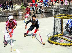 A roller hockey match in progress during the All-India Roller Skating Championship in Mussoorie on Sunday