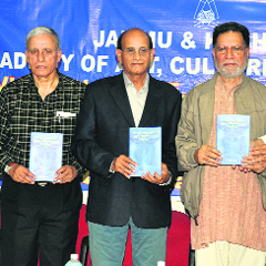 Dogri Sanstha president Prof Lalit Mangotra releases a book Devi Pooja Vidhi Vidhan written by Dr Sushil Sharma, Reader, Punjabi Department, University of Jammu, at KL Seghal hall on Sunday. 