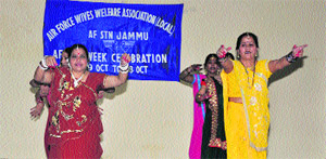 Sanginis give a dance performance in the Jammu Air Force station.
