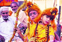 Kids take part in a procession taken out ahead of Valmiki Jayanti in Jalandhar on Saturday