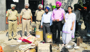 Officials of the health and police departments with seized material in Fatehgarh Sahib.