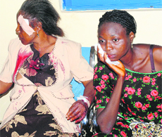 Victims of a bomb attack wait for treatment at Garkuwan hospital in Kaduna on Sunday. 