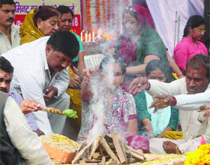 Relatives of the victims at a prayer meeting on the 7th anniversary of the 2005 bomb blast at Sarojini Nagar Market in New Delhi on Monday.