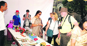 Foreigners at Prerna stall put up at Forest Research Institute in Dehradun on Monday.