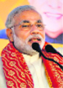 Gujarat Chief Minister Narendra Modi addresses a rally in Kangra on Monday. Photo: Kamaljeet
