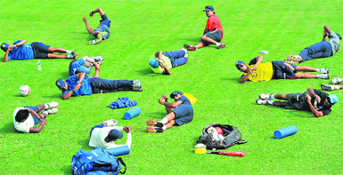 Team India probables undergo stretching excercises after the net sessions in Mumbai on Monday.  PTI
