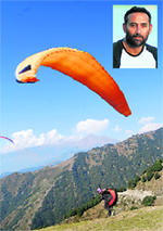 A participant (inset) takes off from Billing on Day Four of the International Paragliding Competition that concluded on Monday.  Tribune photo