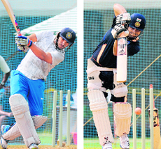 Yuvraj Singh, Suresh Raina slug it out during the nets in Mumbai. Both are vying for the No.6 place in the playing XI.  PTI