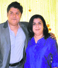 Sajid Khan with sister Farah Khan