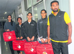 Tennis players of Panjab University with the suitcases in Chandigarh on Tuesday. 