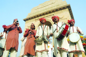 Artistes perform during the celebration of 'Phool Walon Ki Sair' at India Gate in New Delhi on Tuesday.