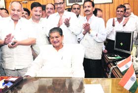 Harish Rawat takes charge as the Union Minister for Water Resources in New Delhi on Tuesday