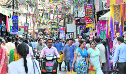 Shoppers at Raj Tilak Road Market in Jammu. Tribune photo: Inderjeet Singh