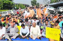 Protesters outside the exhibition ground in Jammu on Tuesday. tribune photo: Anand Sharma