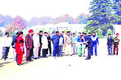 Professor Talat Ahmad, Vice- Chancellor, University of Kashmir, poses with players and officials at the inauguration of the tournament in Srinagar on Tuesday. A TRIBUNE PHOTOGRAPH