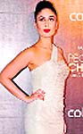Kareena Kapoor: Marriage suits her and the newly-wed looks statuesque and stunning in this gown. 