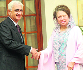 Foreign Minister Salman Khurshid with former Bangladesh President and Bangladesh Nationalist Party chief Khaleda Zia in New Delhi on Tuesday.