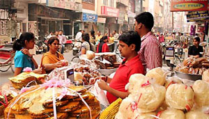 Shoppers look for traditional delicacies ahead of the festive season in a market in Bathinda on Wednesday. 