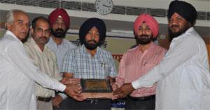 SSP (Vigilance) Sukhdev Singh Chahal (second from right) being honoured along with the other guests at a seminar held at Baba Farid Group of Institutions, on Wednesday