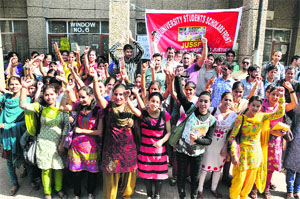 JURSEA scholars stage a protest against alleged favouritism in the University of Jammu on Wednesday.