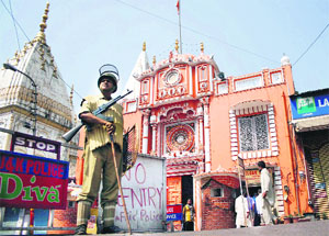 Security personnel on vigil outside Raghunath Temple.