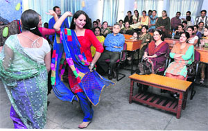 Students participate in a freshers party at the Dogri Department in the University of Jammu on Wednesday.