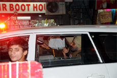 SSP Bathinda Ravcharan Singh Brar (wireless in hand) patrols the city in his vehicle on Thursday. 