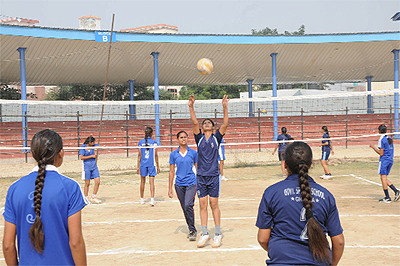 Girls take part in the selection trials for volleyball at the multipurpose sports stadium in Bathinda ahead of the sports meet that will begin in the city on Friday. 