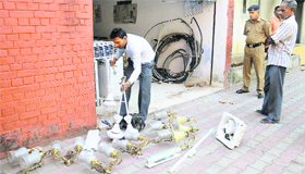 A staff member of former Punjab DGP PS Gill packs his belongings while vacating his official accommodation in Sector 16, Chandigarh, on Thursday.