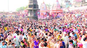 Devotees of the Sacha Sauda from Sirsa clean Har-ki-Pauri as part of a cleanliness drive in Haridwar on Thursday. 