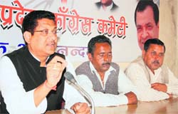 Suryakant Dhasmana, vice-president of the Uttarakhand Congress, addresses a press conference in Dehradun on Thursday.
