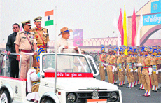 Union Home Minister Sushil Kumar Shinde takes the salute at the 73rd Anniversary celebrations of the CRPF in Gurgaon. 