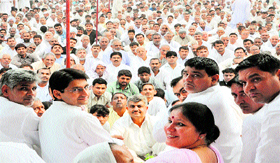 Education Minister Geeta Bhukkal accompanied by Rohtak MP Deepender Hooda on dais during workers meeting in Jhajjar. Photo by writer