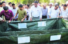 Officers from the Agriculture Department and Actech Company at the farmers awareness camp in Reasi on Thursday. 