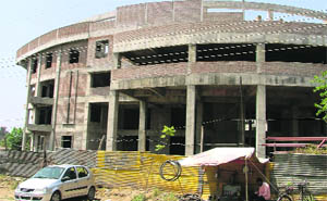 Work under way at the indoor stadium on Pakhowal Road in Ludhiana. 