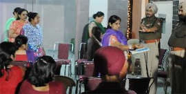 Policemen investigate at the site of the crime. 