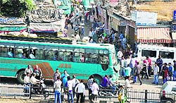 A heavy rush outside the general bus stand in Jammu