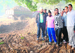 Industry Minister Anil Joshi inspects the excavated site at Ram Bagh in Amritsar on Friday. Photo: Sameer Sehgal