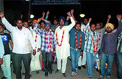 Unemployed linesmen raise slogans after they were released from the Bathinda Central Jail on Saturday evening