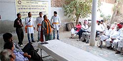 A team presenting a play on the importance of cleanliness at Chandsar Basti