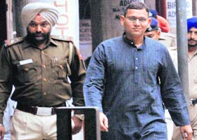 Deshraj Singh comes out of a district court in Sector 17, Chandigarh, on Saturday