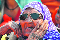 At a rally, all she can do is wonder at the lies politicians feed her.