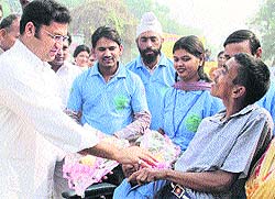 Special children receive MP Ashok Tanwar on his visit to their school in Sirsa on Saturday