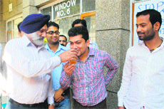 Vice-Chancellor Prof Mohan Paul Singh Ishar offers juice to a scholar who was on a hunger strike in Jammu on Saturday.