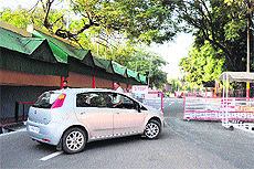 Barricades put up by the police on a road leading to the Civil Secretariat in Jammu on Saturday.